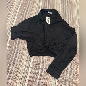 never worn!! black amazon brand elastic bottom crop top with collar size small.